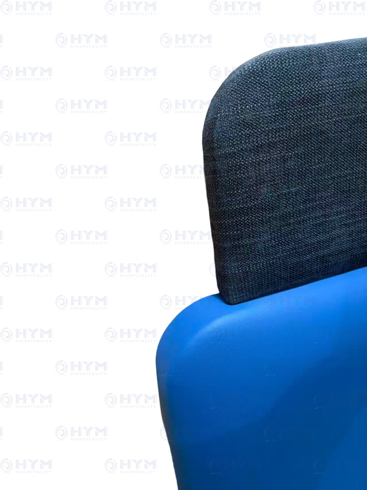 Close-up of the tiered connection on a Hampton Inn headboard, showcasing the precision stitching between Navy top-tier fabric and Harbor vinyl bottom.