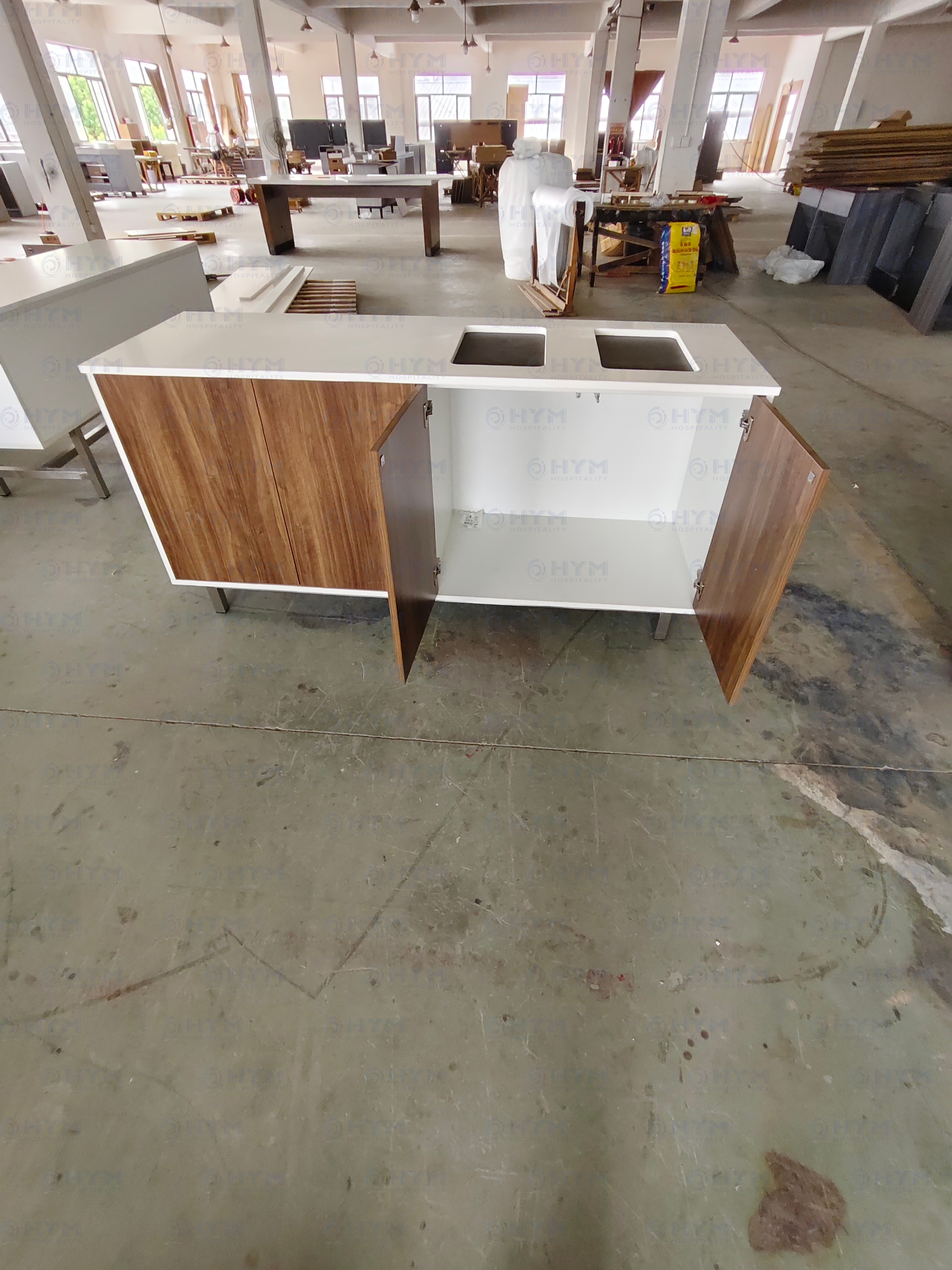 Factory-direct production sample of the EXP2-211 trash console, staged for quality control at Hyman Hospitality’s facility.