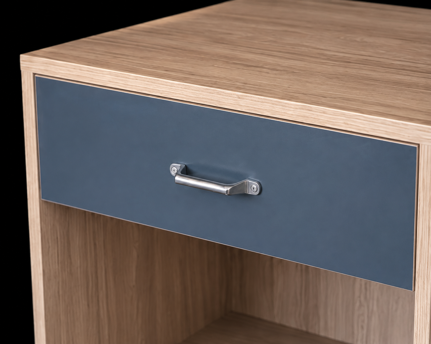 Detailed view of Top Knobs "Channing" brushed nickel handle and Formica Terril Plex drawer face on the CG-207 nightstand.