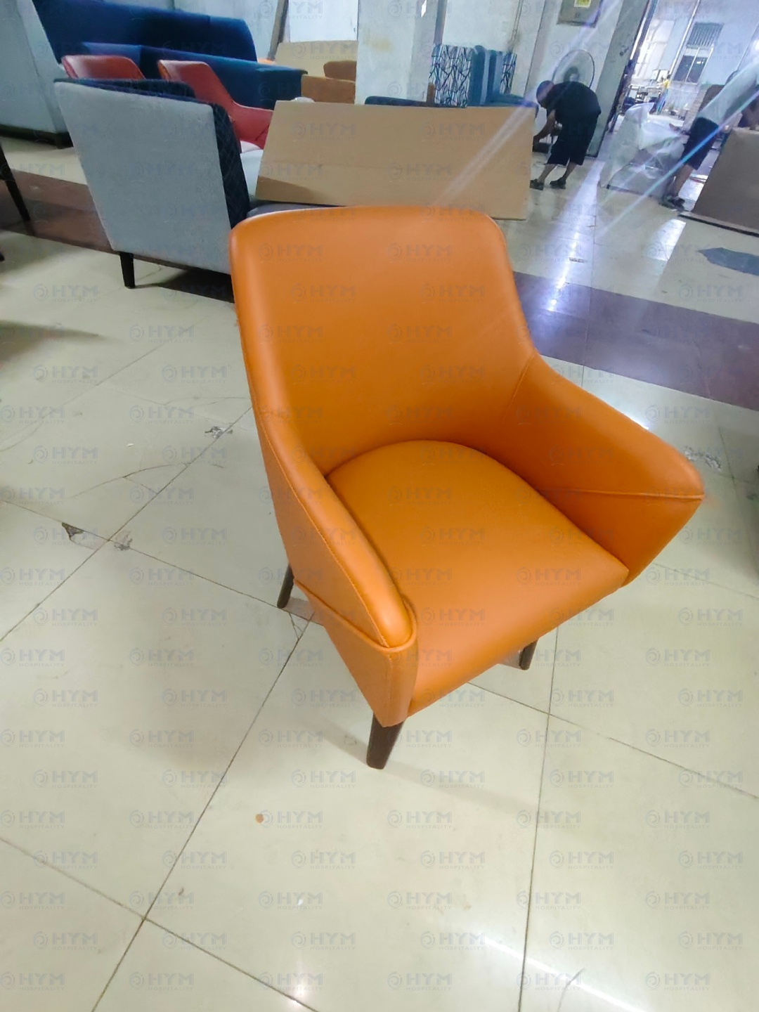 Side profile of custom manufactured hospitality chairs ready for hotel property improvement plans (PIP)