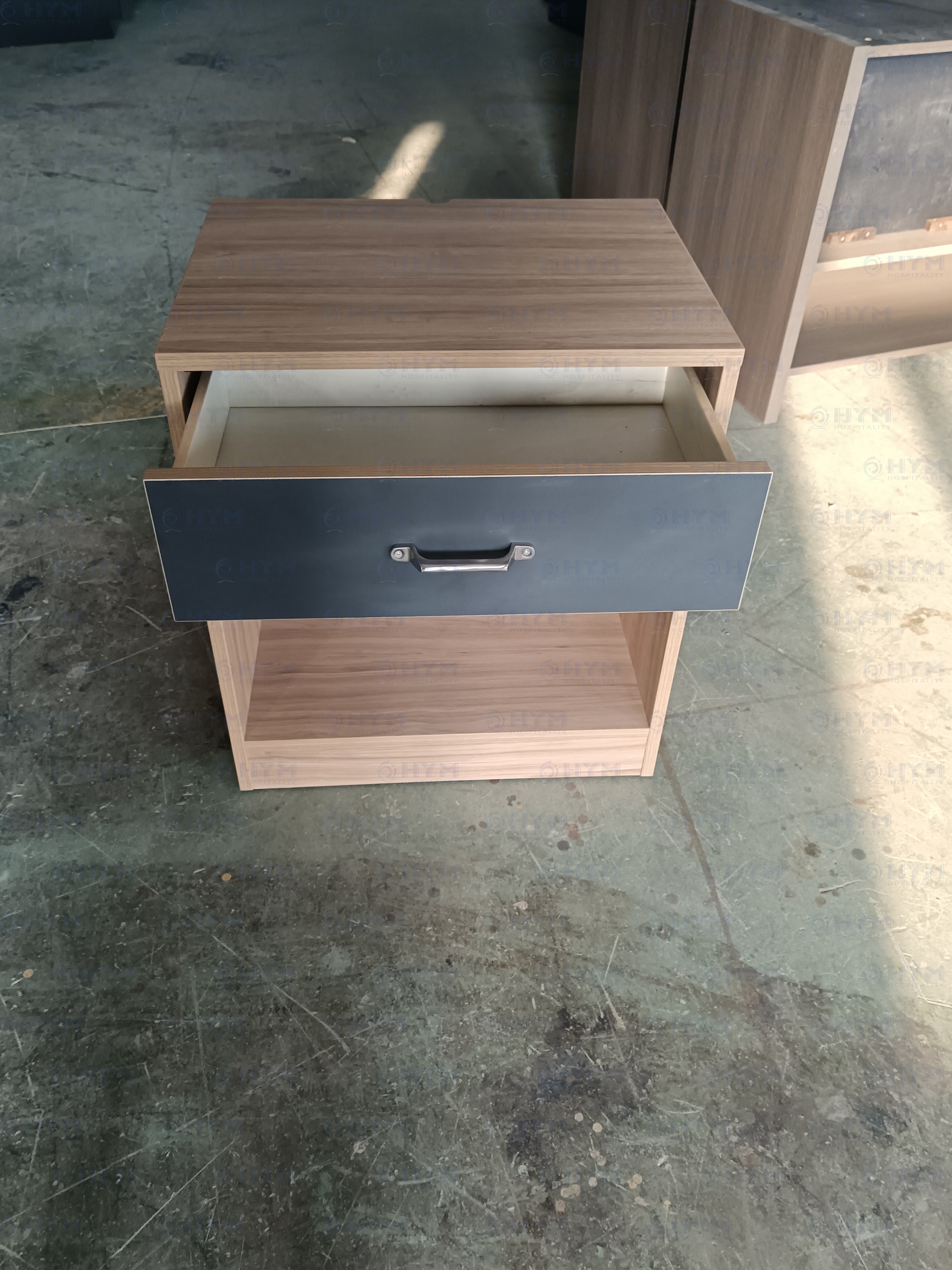 Functional view of the CG-207 hotel guestroom nightstand with drawer open, showing the depth and space for guest essentials.