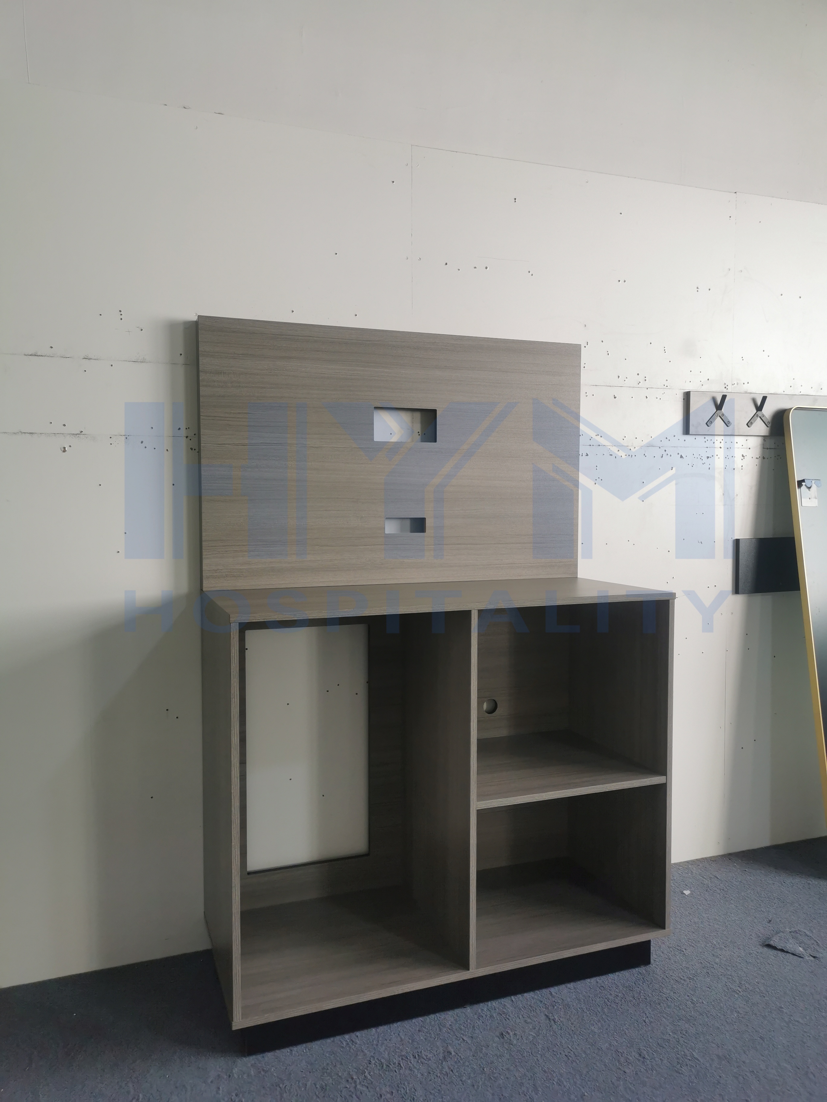 GR-311 grey wood grain hotel media console front-right angle view highlighting shelf depth and recessed cable niches