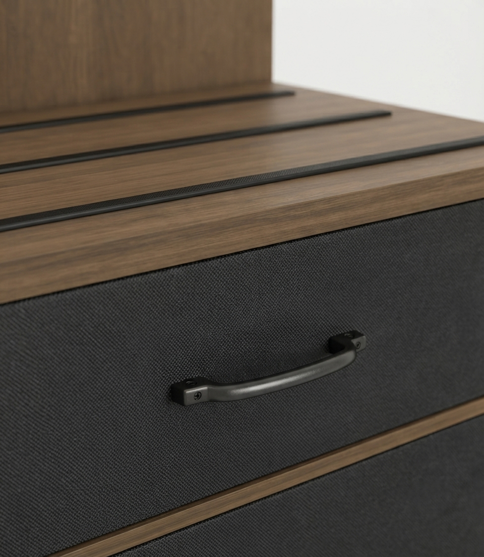 Close-up of Top Knobs Channing series brushed satin nickel pulls paired with Formica Terril Plex textured drawer fronts for Candlewood Suites.