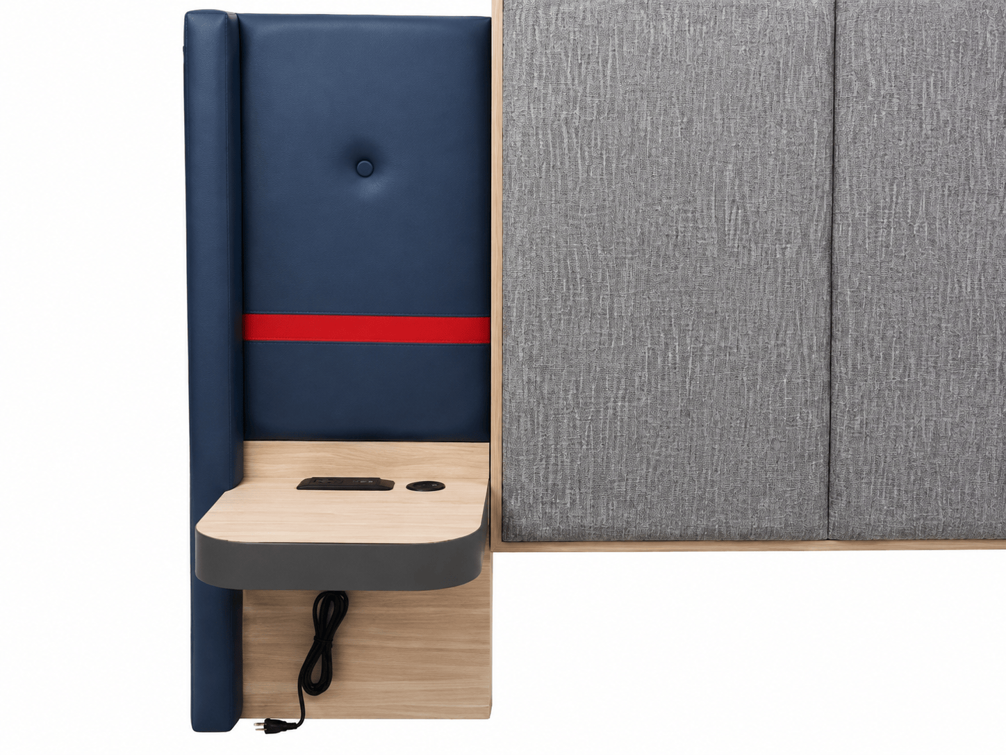 Detailed close-up of Avid Hotels nightstand showing integrated UL-listed power module and grey textured fabric upholstery.