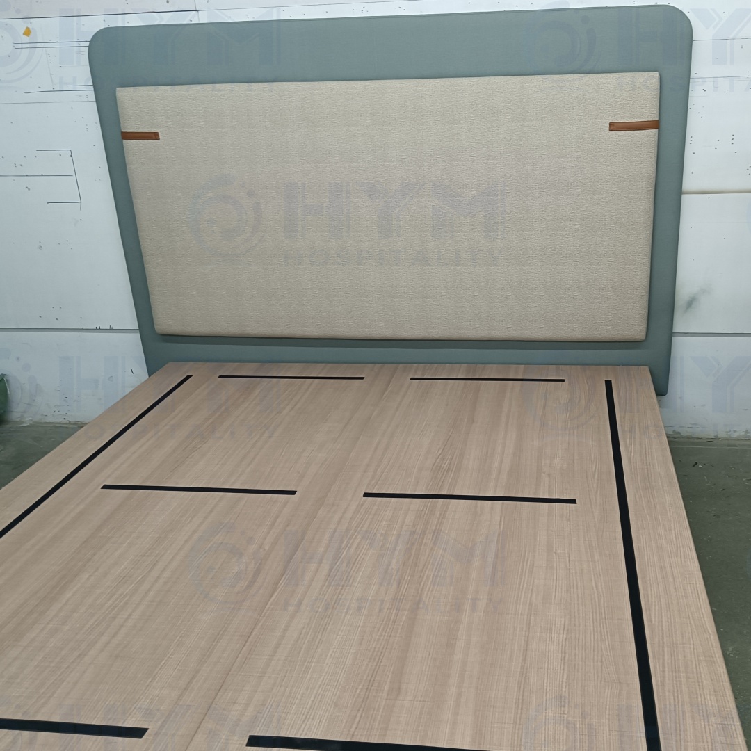 Factory-direct production and staging of institutional-grade King headboards and bed bases, featuring fire-retardant foam and CAL 117 compliant upholstery.